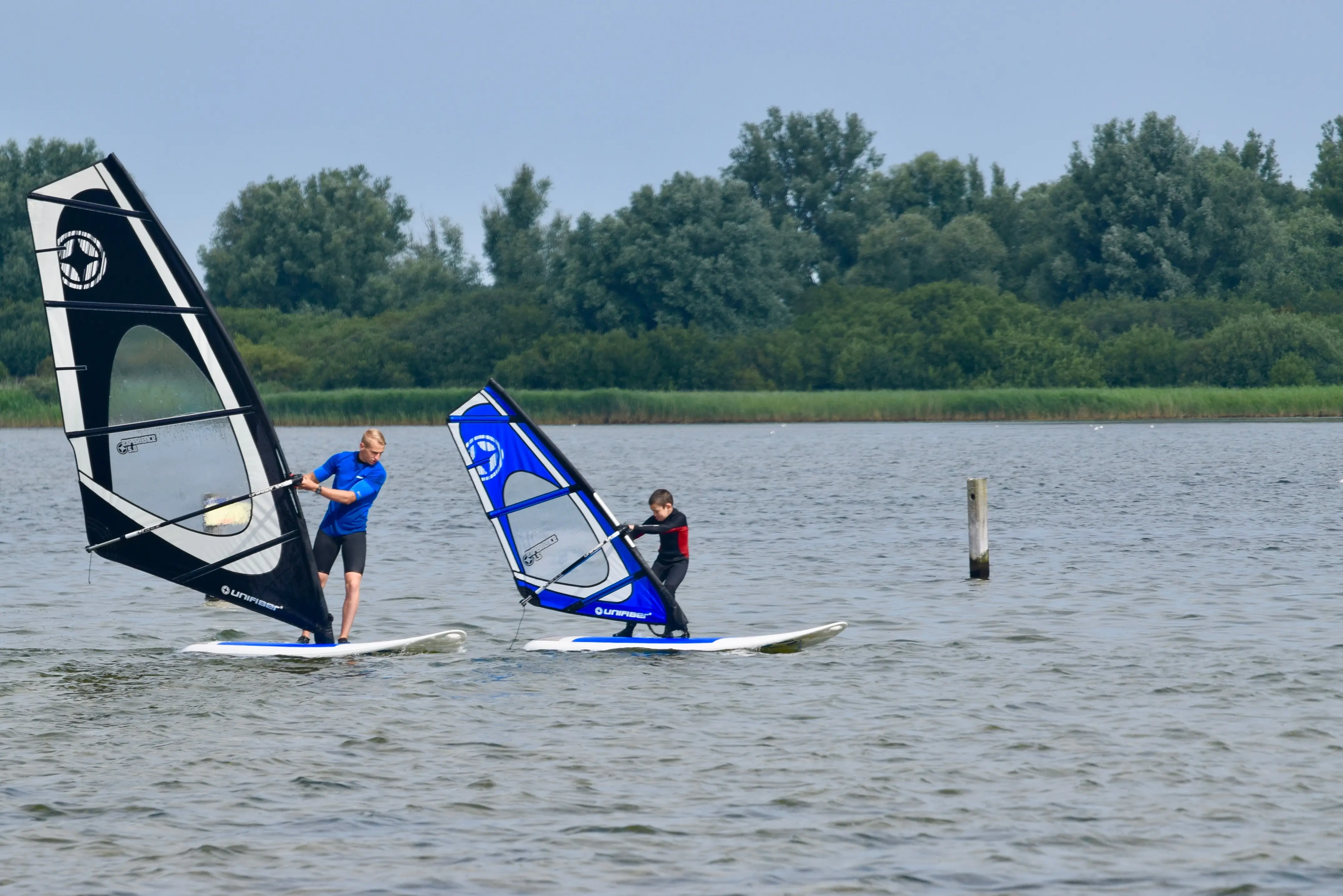 Kinderles 1 Windsurf les met kind